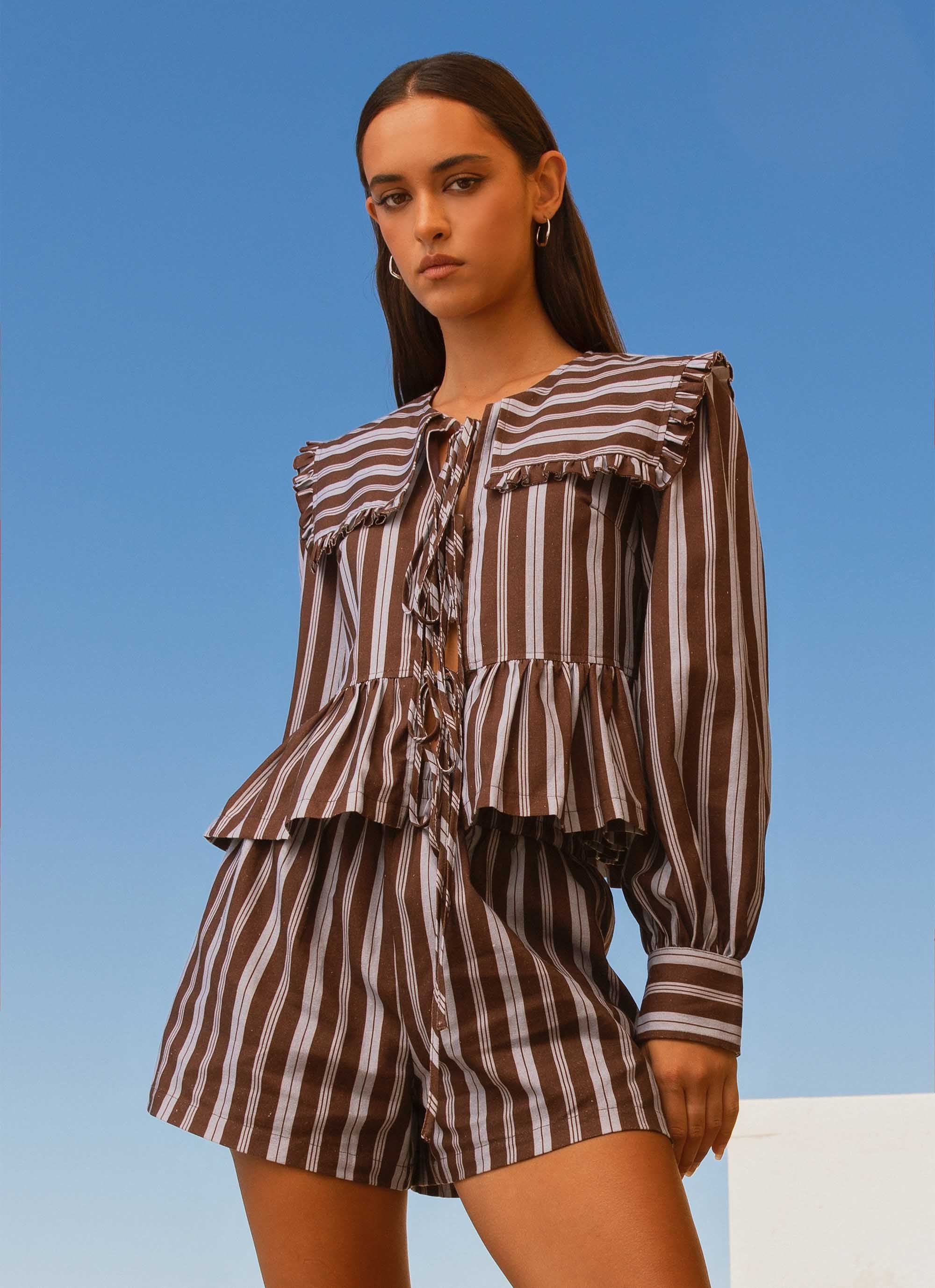 UO Emerson manca Gingham Ruffle Jumpsuit