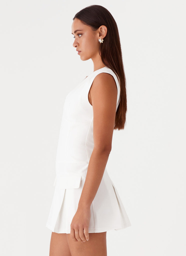 Womens Cassia Mini Dress in the colour White in front of a light grey background