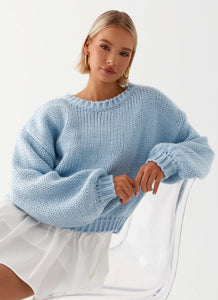 Womens Costella Knit Sweater in the colour Blue in front of a light grey background