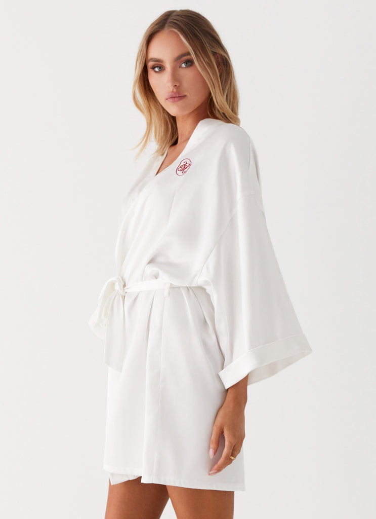 Womens Emmy Satin Robe in the colour White in front of a light grey background