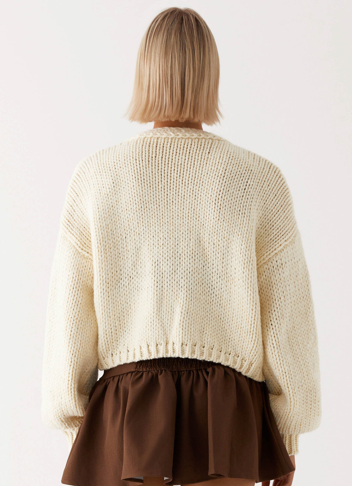 Womens Jasleen Knit Cardigan in the colour Ivory in front of a light grey background