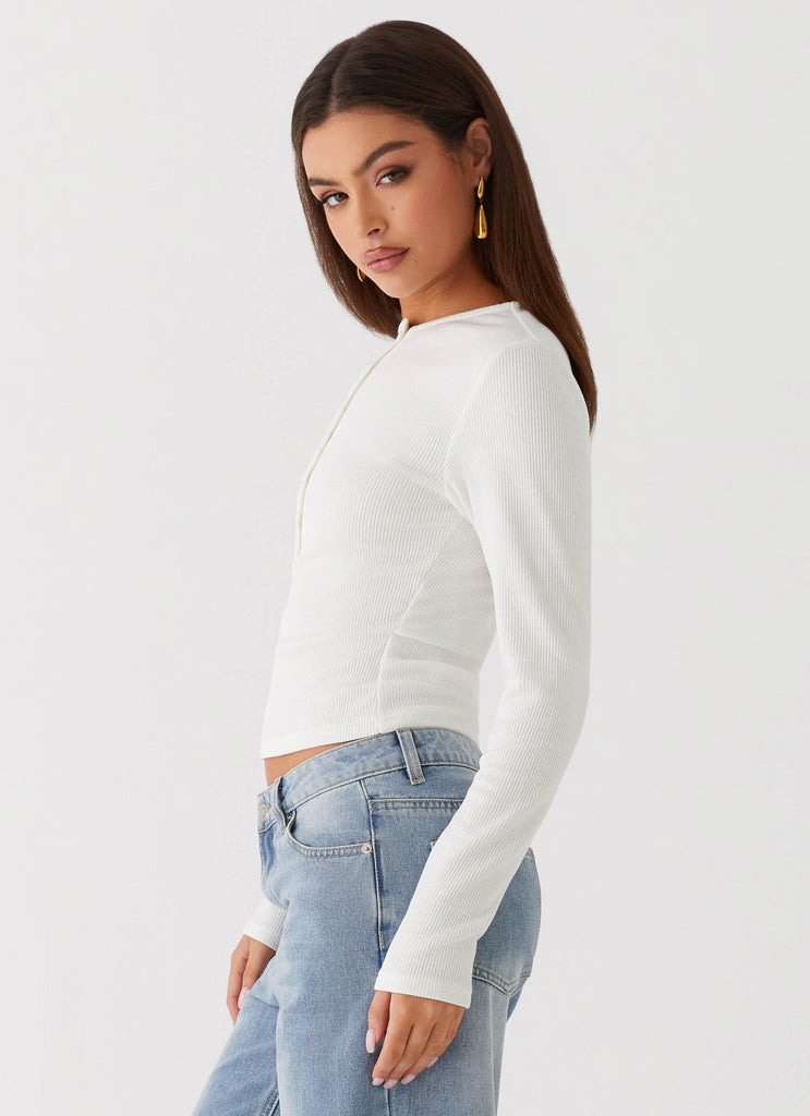 Womens Kellie Long Sleeve Knit Top in the colour White in front of a light grey background