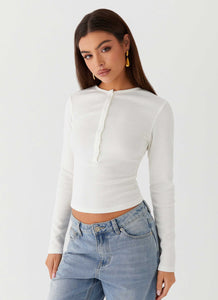 Womens Kellie Long Sleeve Knit Top in the colour White in front of a light grey background