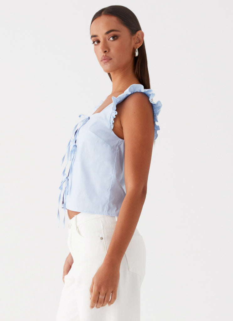 Womens Kiani Tie Front Top in the colour Blue in front of a light grey background