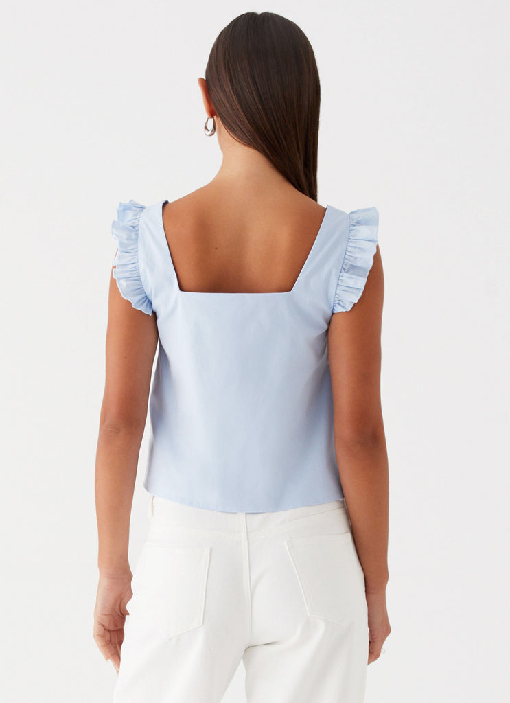 Womens Kiani Tie Front Top in the colour Blue in front of a light grey background