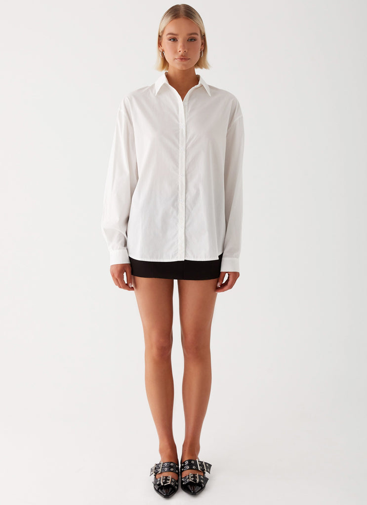 Womens Laurel Long Sleeve Oversized Shirt in the colour White in front of a light grey background