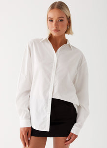 Womens Laurel Long Sleeve Oversized Shirt in the colour White in front of a light grey background