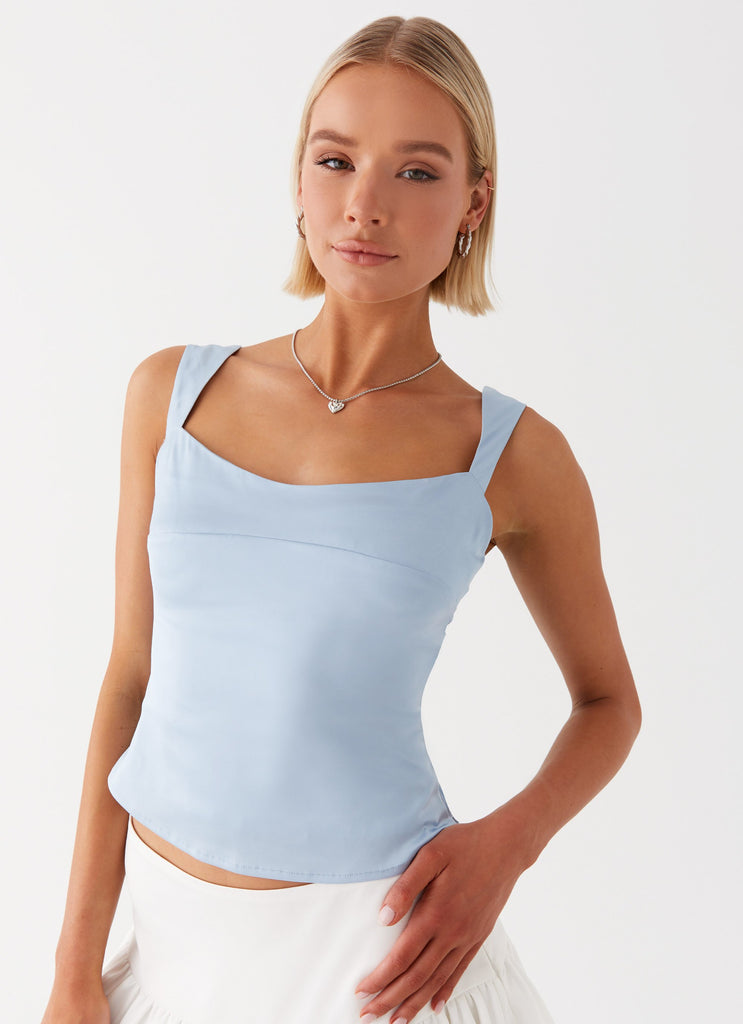 Womens Lylah Satin Top in the colour Blue in front of a light grey background