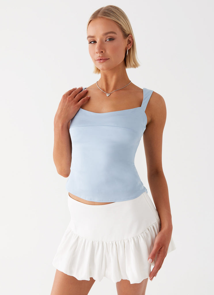 Womens Lylah Satin Top in the colour Blue in front of a light grey background