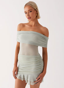 Womens Sabine Linen Mini Dress  in the colour  Floral Wave in front of a light grey background