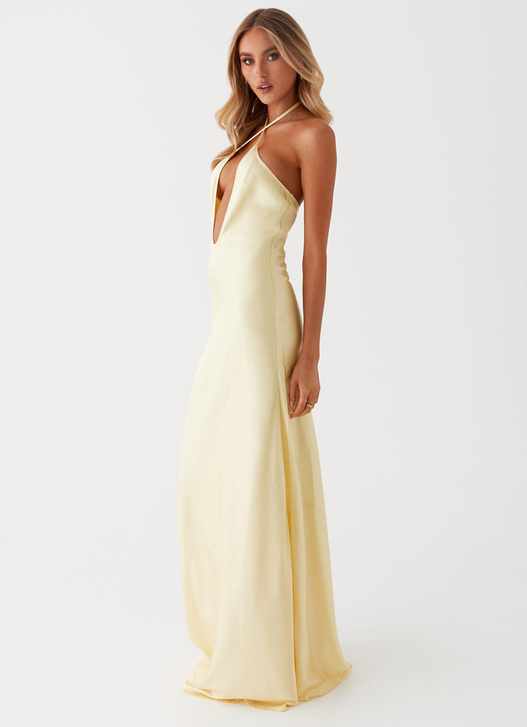 Womens Noir Symphony Maxi Dress in the colour Yellow in front of a light grey background