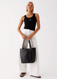 Womens Good For You Shoulder Bag  in the colour  Black in front of a light grey background