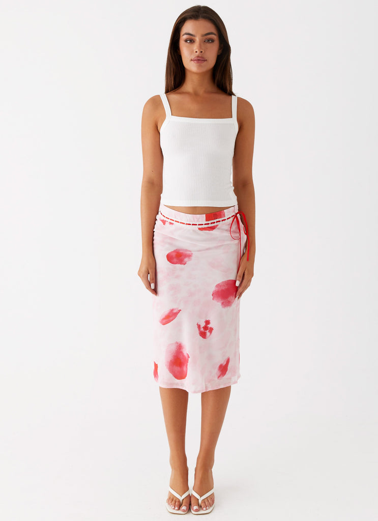 Womens Peony Quartz Midi Skirt in the colour Pink Poppy in front of a light grey background