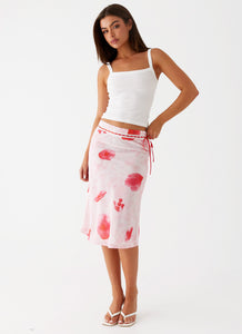 Womens Peony Quartz Midi Skirt in the colour Pink Poppy in front of a light grey background