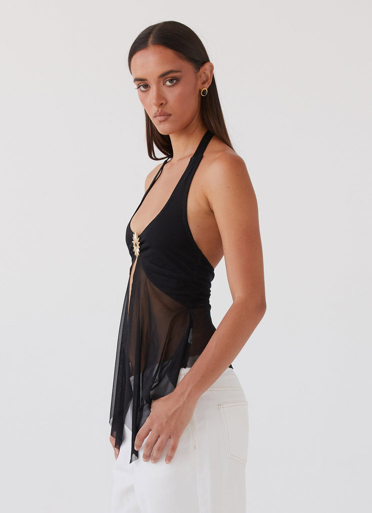 Womens Sunbeam Mesh Top in the colour Black in front of a light grey background