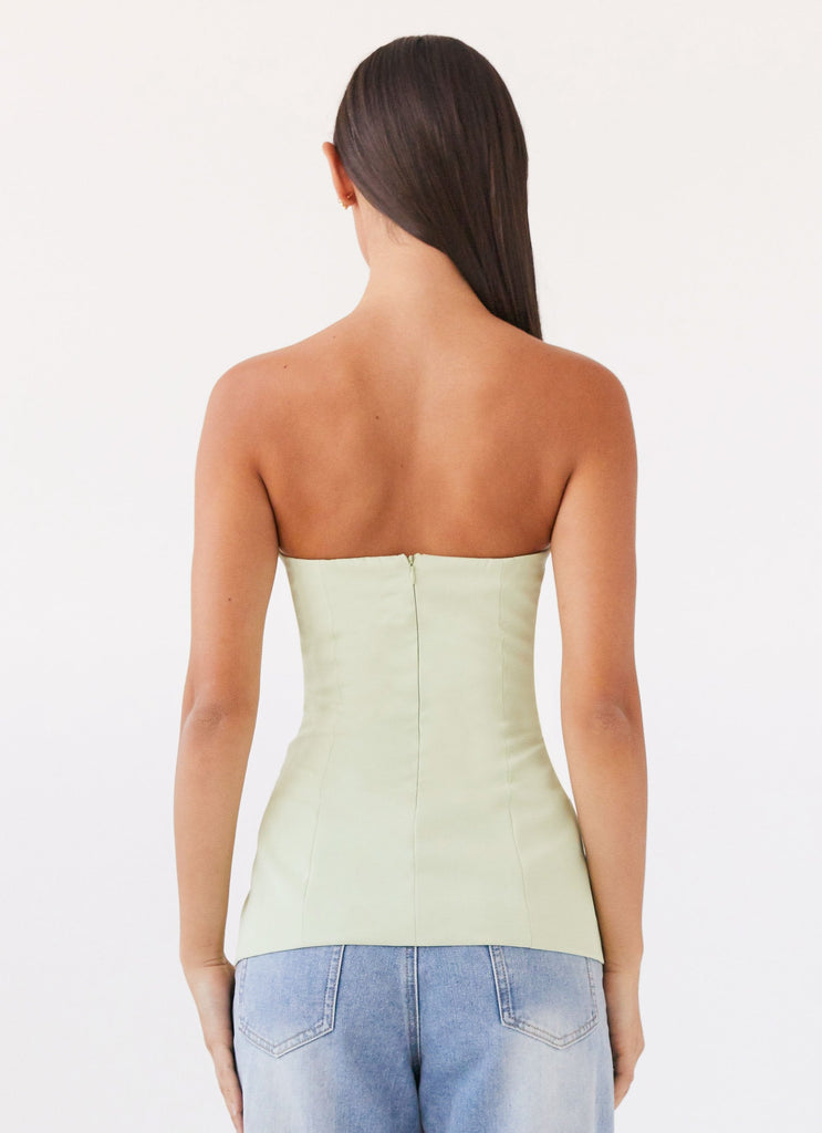 Womens Riveria Tailored Strapless Top in the colour Green Zest in front of a light grey background