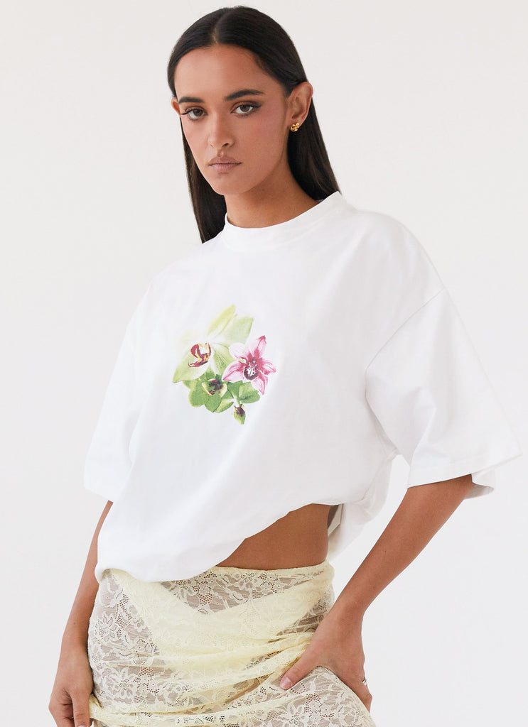 Womens Lillies Oversized Tee in the colour White in front of a light grey background