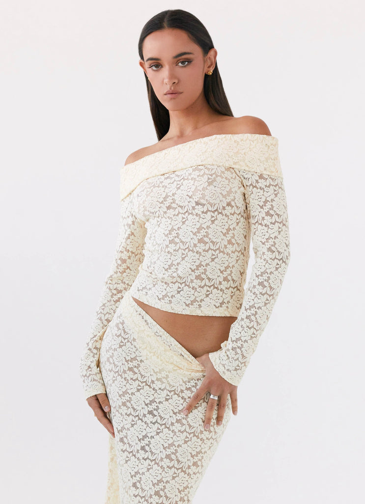 Womens Zephyra Lace Long Sleeve Top in the colour Natural in front of a light grey background