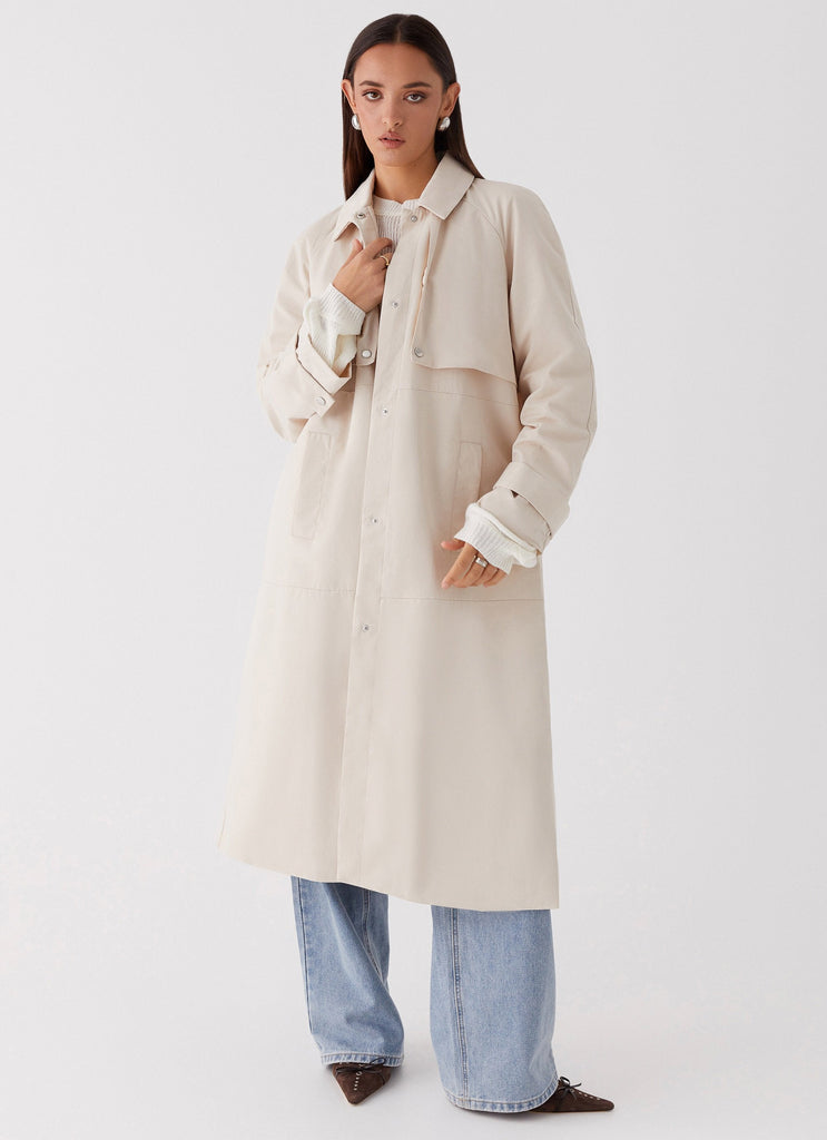 Womens Fill The Void Oversized Trench Coat in the colour Ivory in front of a light grey background