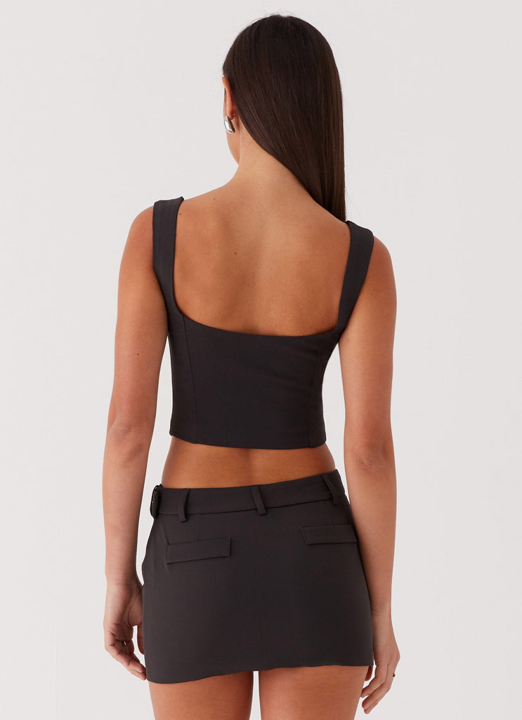 Womens Walk On By Belt Top in the colour Black in front of a light grey background