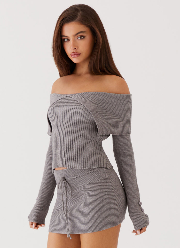 Womens Maura Low Rise Mini Skirt in the colour Charcoal in front of a light grey background