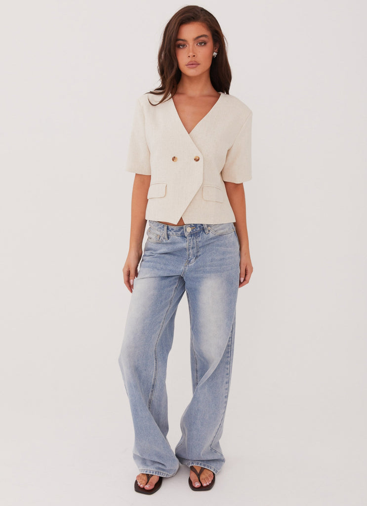 Womens Hacienda Linen Short Sleeve Blazer in the colour Oatmeal in front of a light grey background