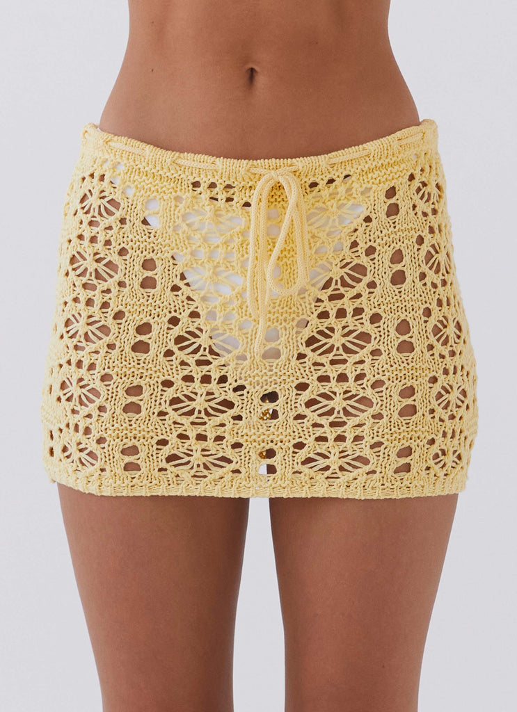 Womens Free Mind Crochet Mini Skirt in the colour Marigold in front of a light grey background