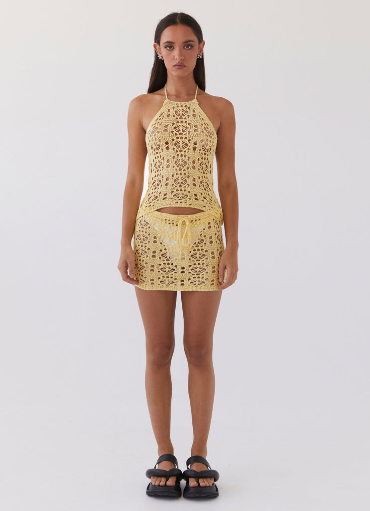 Womens Free Mind Crochet Mini Skirt in the colour Marigold in front of a light grey background