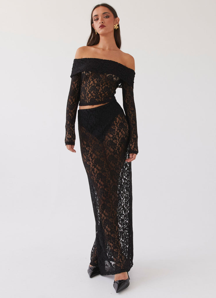 Womens Zephyra Lace Maxi Skirt in the colour Black in front of a light grey background