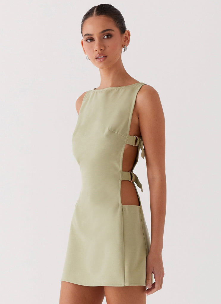 Womens Cherish You Buckle Mini Dress in the colour Olive in front of a light grey background