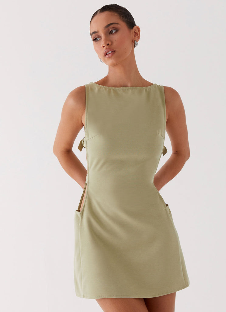 Womens Cherish You Buckle Mini Dress in the colour Olive in front of a light grey background