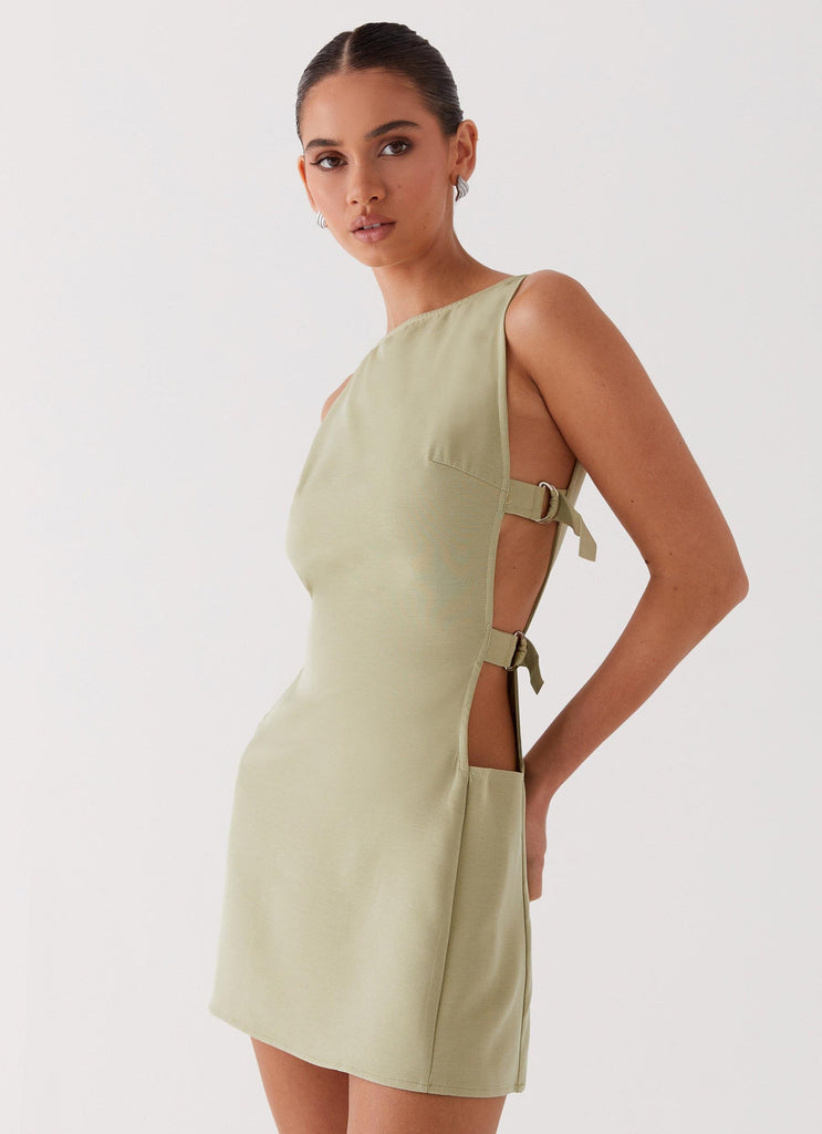 Womens Cherish You Buckle Mini Dress in the colour Olive in front of a light grey background