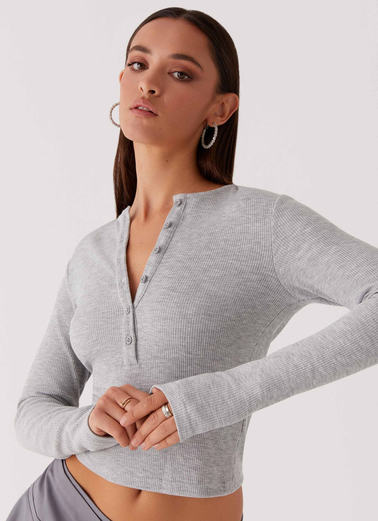 Womens Kellie Knit Long Sleeve Top in the colour Grey in front of a light grey background