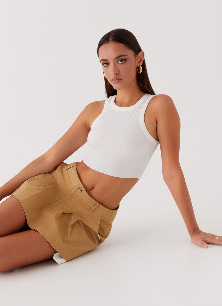 Womens Tegan Cargo Mini Skirt in the colour Tan in front of a light grey background