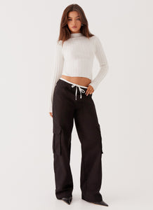 Womens Grace Lily Cargo Pants in the colour Black in front of a light grey background