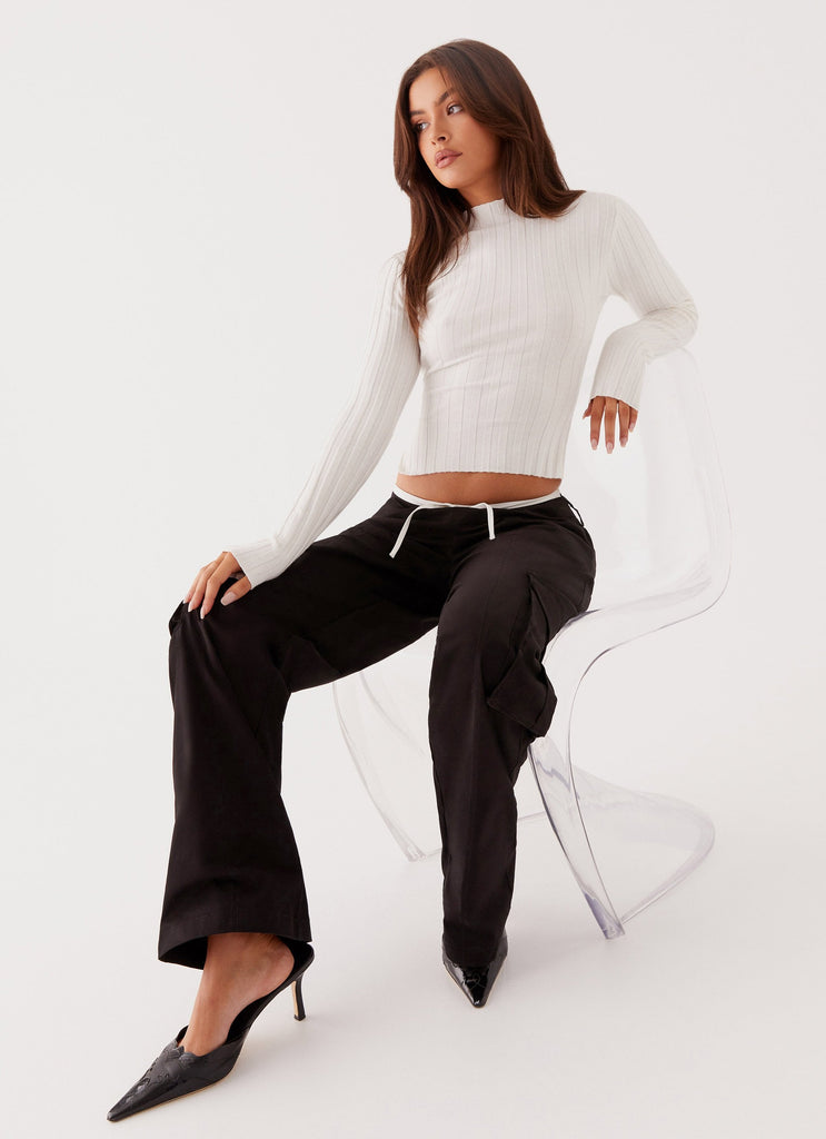 Womens Grace Lily Cargo Pants in the colour Black in front of a light grey background