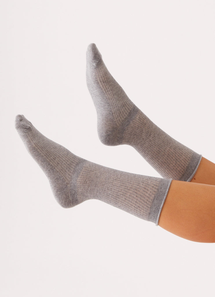 Womens Ludde Ankle Socks in the colour Grey in front of a light grey background