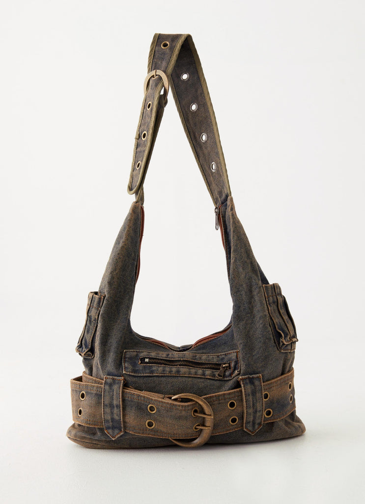 Womens Reevie Buckle Bag in the colour Denim Blue in front of a light grey background