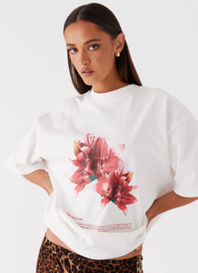 Womens Born To Have Fun Oversized Graphic Tee in the colour Tulip in front of a light grey background