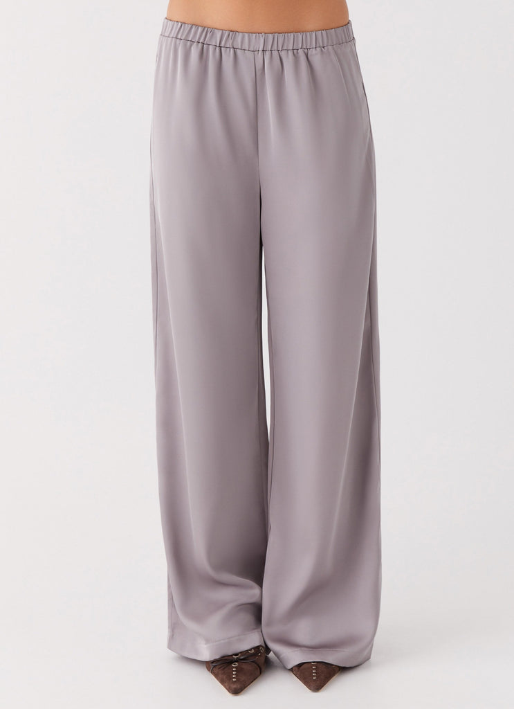 Womens Palm Cove Satin Pants in the colour Grey in front of a light grey background