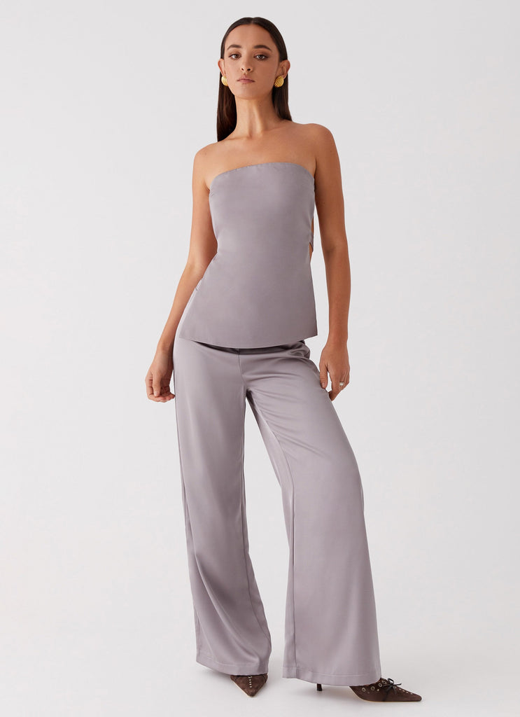 Womens Palm Cove Satin Pants in the colour Grey in front of a light grey background