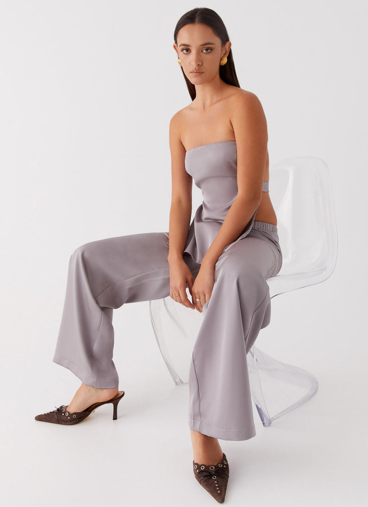 Womens Palm Cove Satin Pants in the colour Grey in front of a light grey background