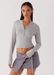 Womens Kellie Knit Long Sleeve Top in the colour Grey in front of a light grey background