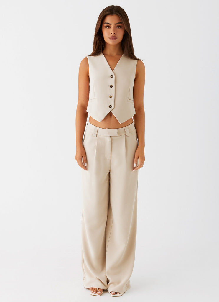 Womens Midnight City Suit Pants in the colour Beige in front of a light grey background