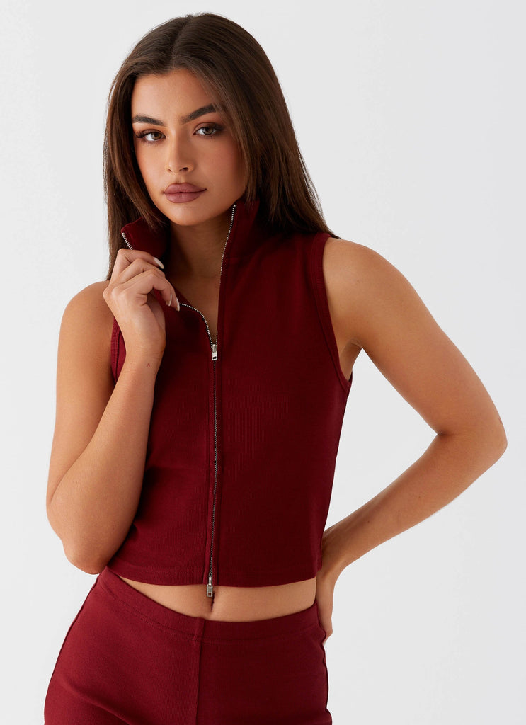 Womens Spectate Collar Top in the colour Maroon in front of a light grey background