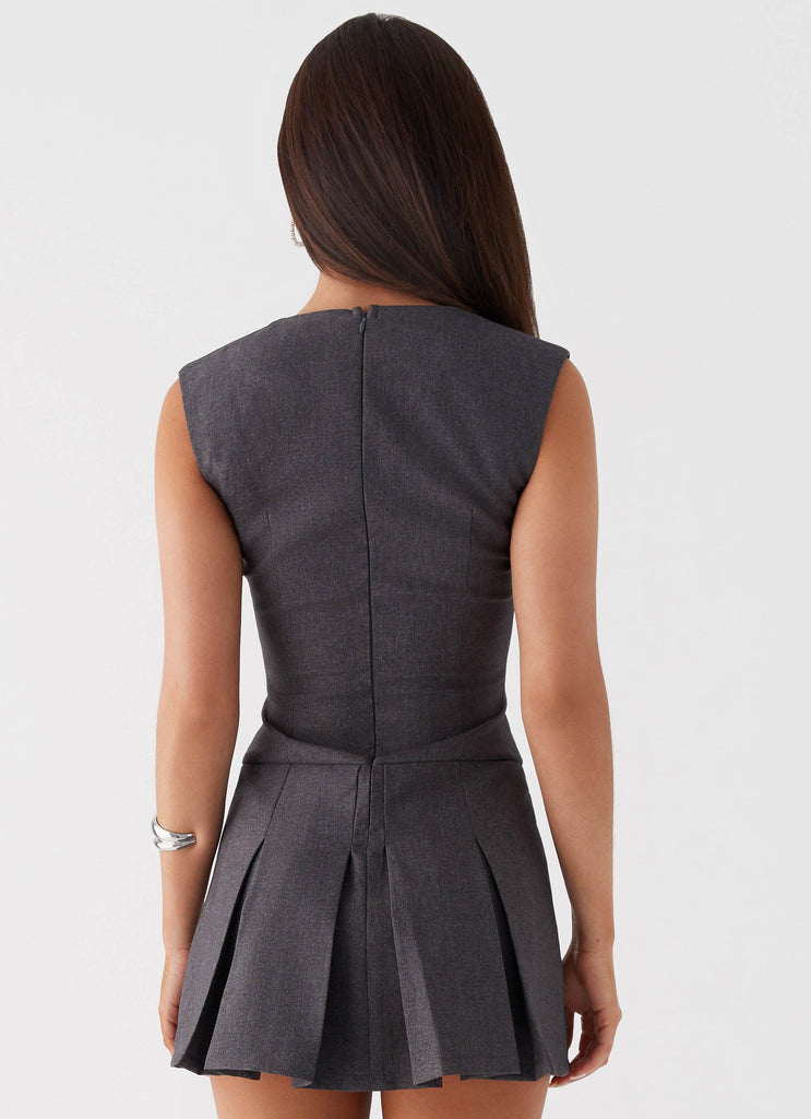 Womens Cassia Mini Dress in the colour Charcoal in front of a light grey background