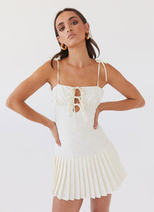 Womens Love Seeker Corset Mini Dress in the colour Ivory in front of a light grey background