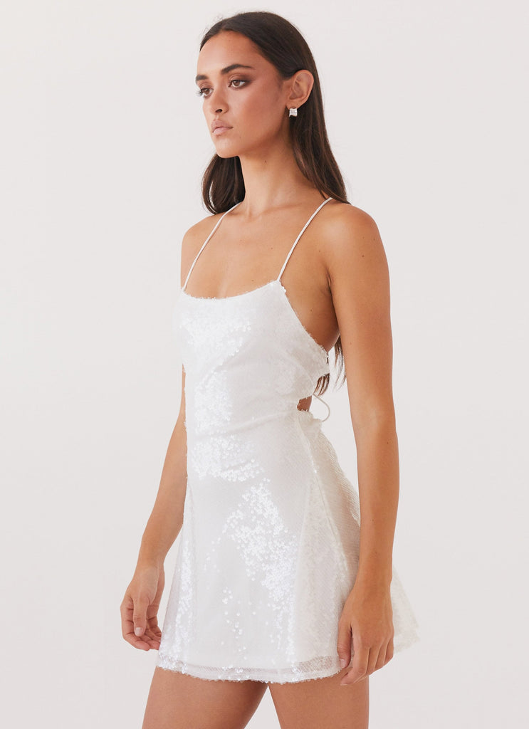 Womens Endless Glow Sequin Mini Dress in the colour White in front of a light grey background