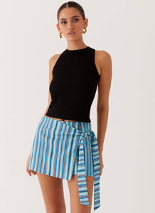 Womens Steal Away Linen Wrap Skirt in the colour Blue Stripe in front of a light grey background