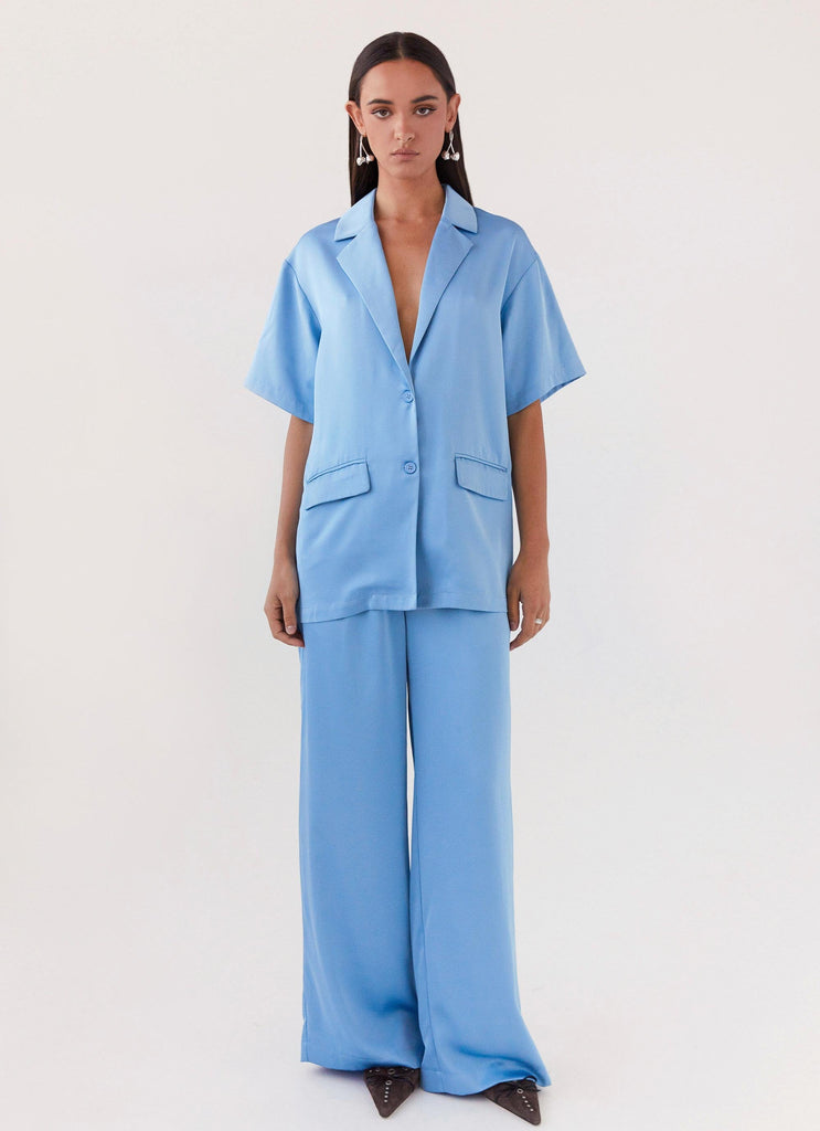 Womens Brinkley Oversized Satin Shirt in the colour Sky Blue in front of a light grey background